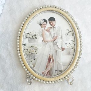 Oval 8” * 10” photo frame with pearls